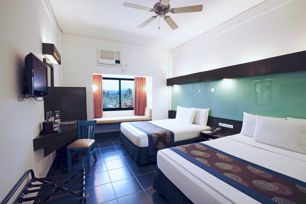 Microtel By Wyndham Puerto Princesa Exterior photo